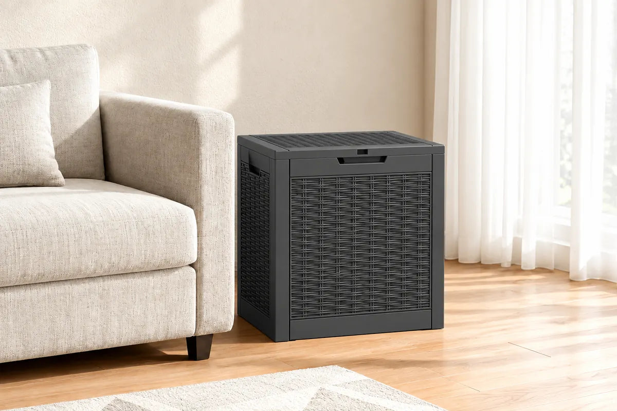 Charcoal rattan-look resin storage box beside a beige sofa in a bright living room